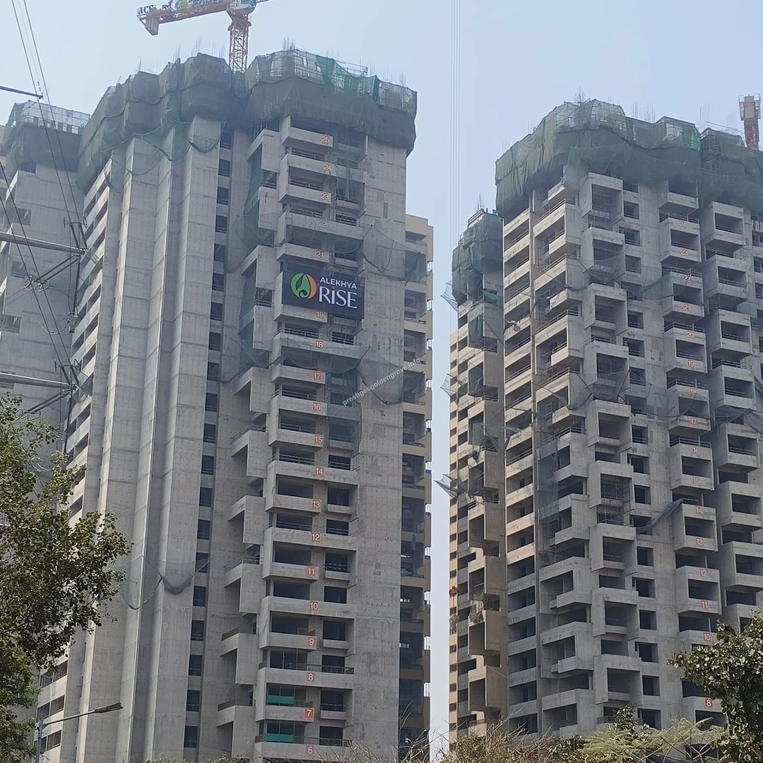 Alekhya Rise Construction Ongoing construction of the Alekhya Rise project highlighting the thriving and expanding real estate neighborhood of Prestige Golden Grove