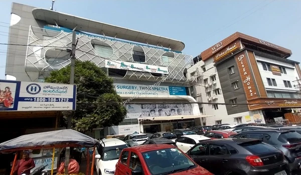 Apollo Spectra Hospital The modern facade of Apollo Spectra Hospitals in Kondapur offering specialized medical services within a short drive from Prestige Golden Grove