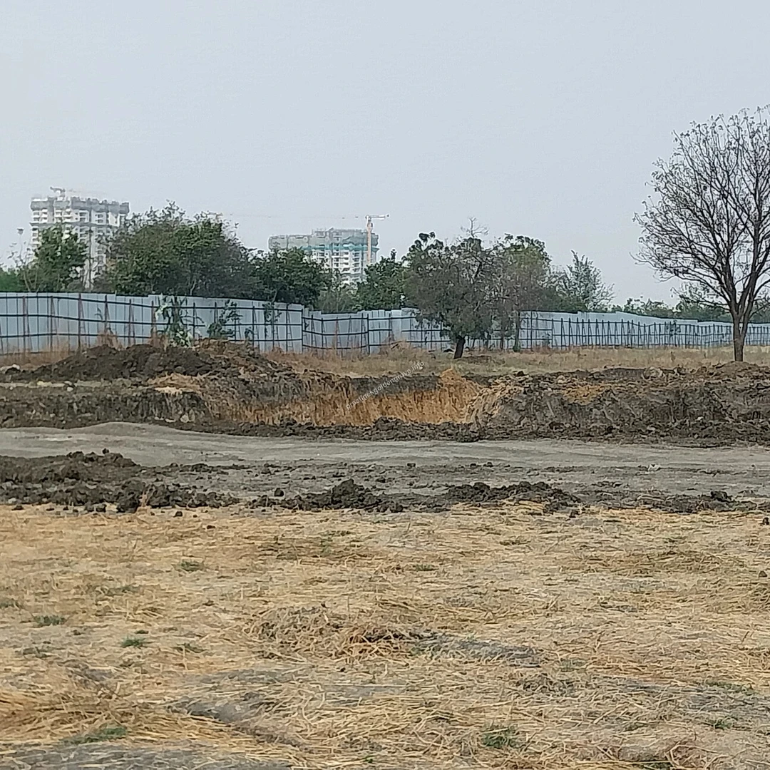Cement Mixing A heavy-duty cement mixer truck parked on site amidst the ongoing preliminary groundwork at Prestige Golden Grove