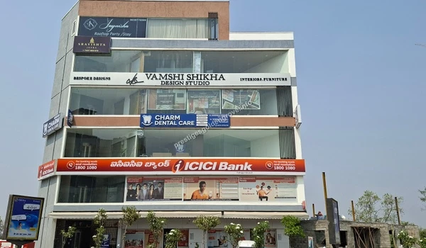 Charm Dental Clinic View of a commercial building featuring Charm Dental Care and essential banking facilities, located conveniently close to the Prestige Golden Grove residential project