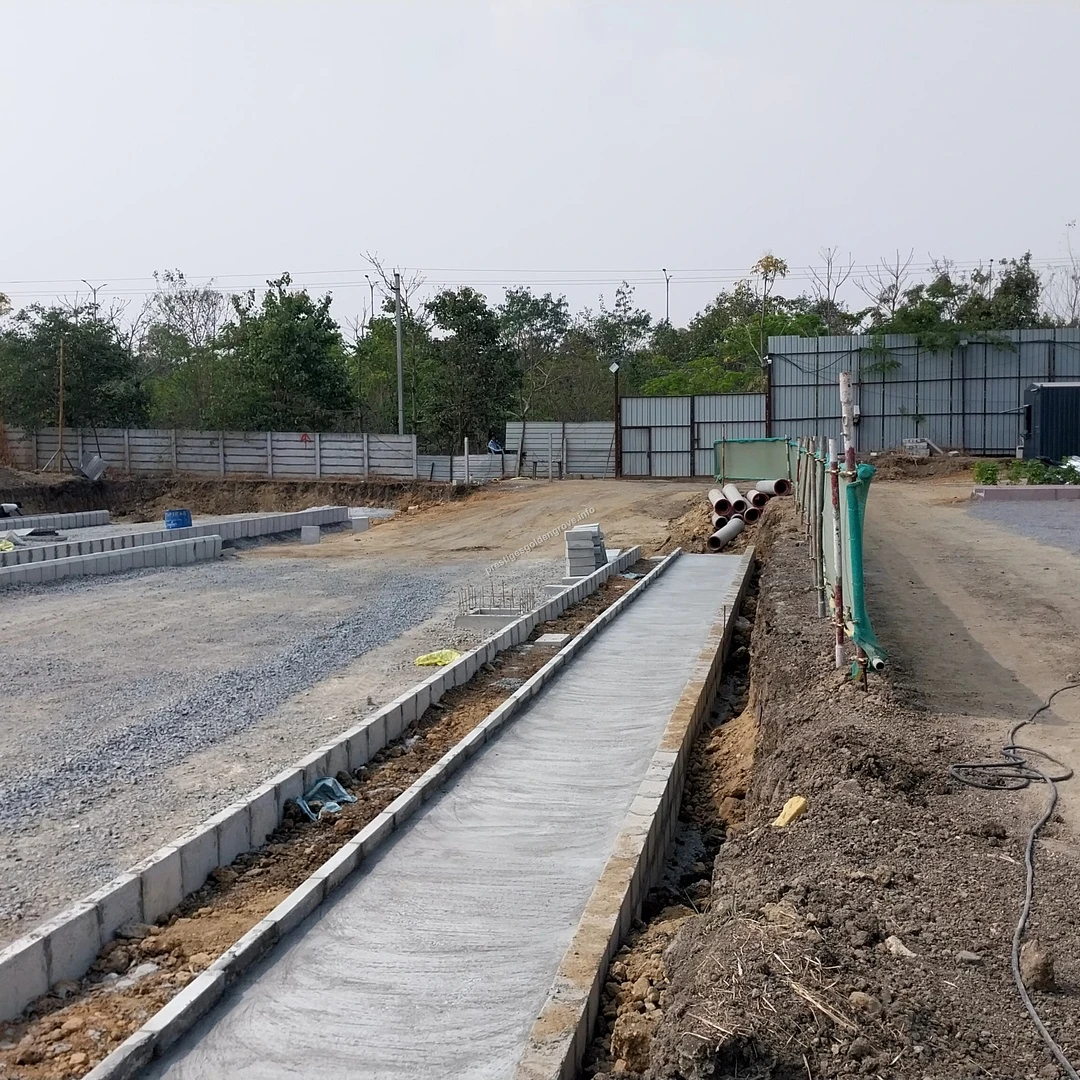 Drainage Construction Detailed view of concrete curbing and drainage channel construction along the internal pathways of Prestige Golden Grove