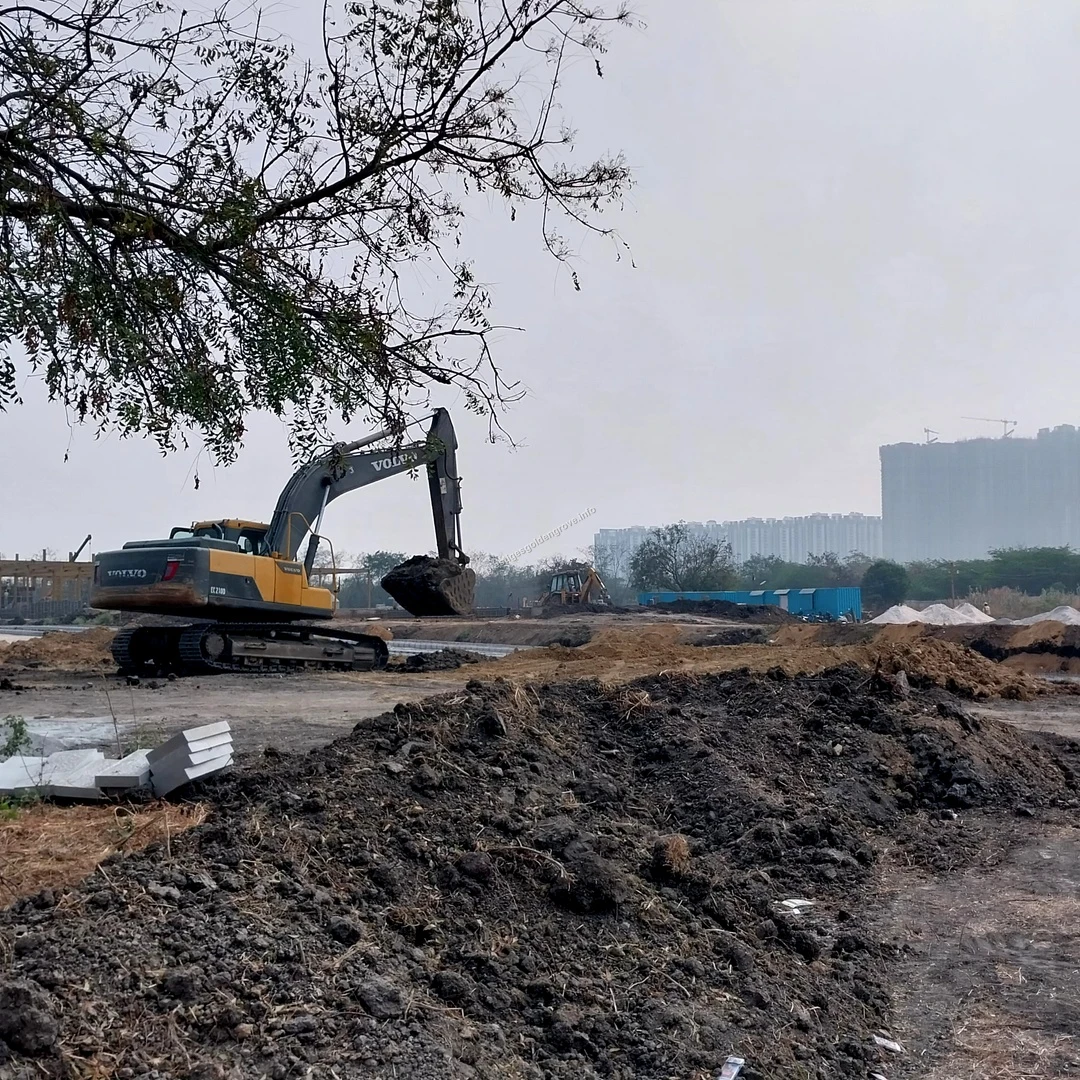 Earthmoving Work Heavy excavator machinery moving dirt and preparing the terrain at the Prestige Golden Grove development site