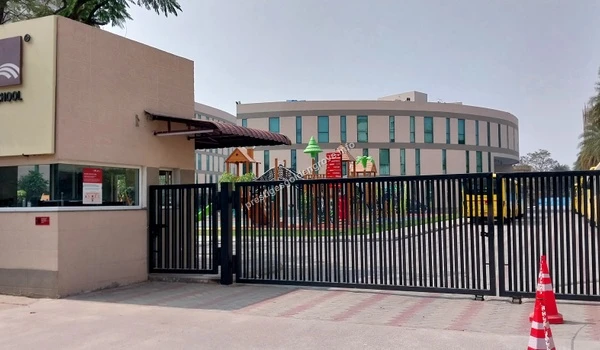 Lingampalli School Infrastructure Exterior view of a modern school facility in Lingampalli showcasing the excellent educational infrastructure available to Prestige Golden Grove residents