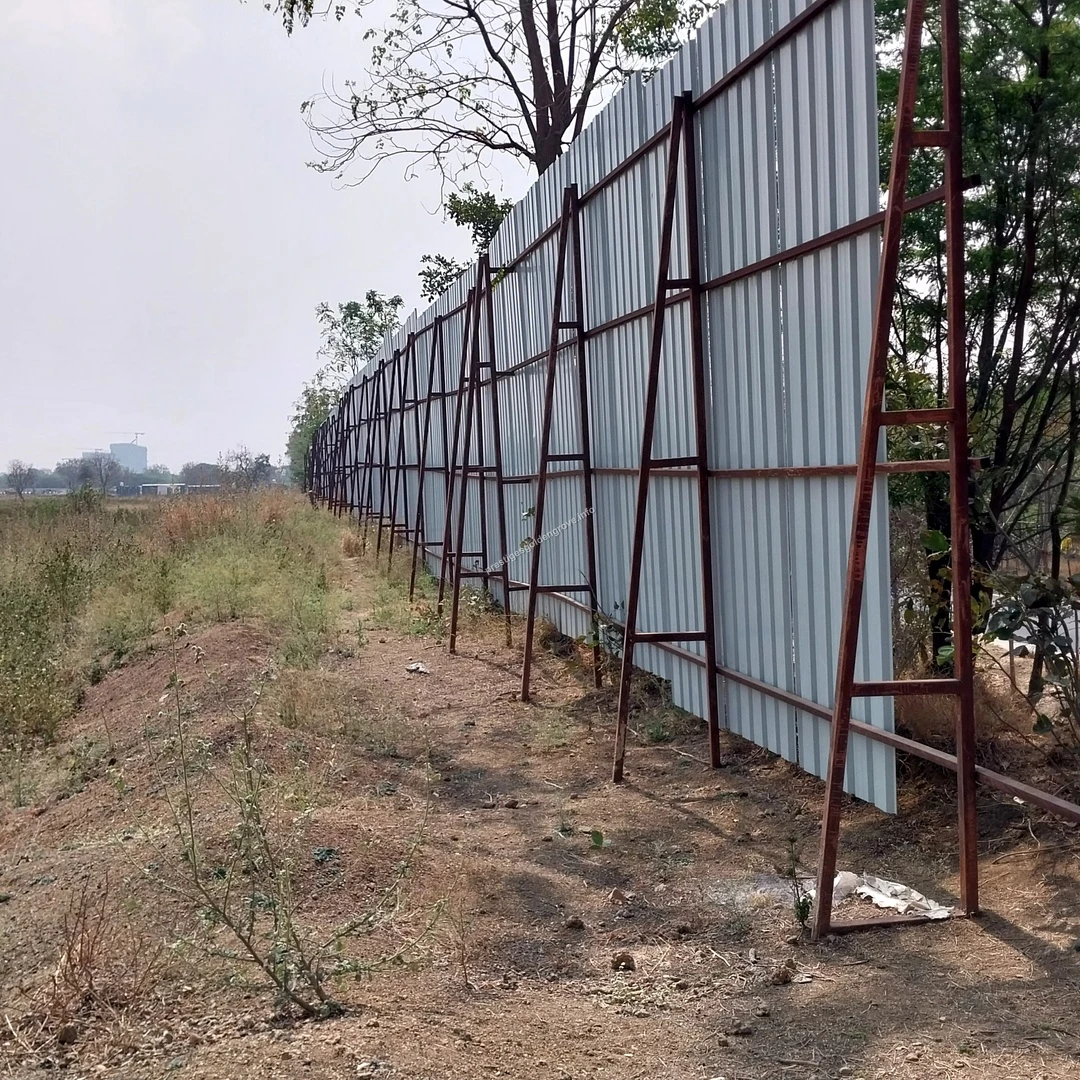 Metal Barricade Sturdy corrugated metal barricades installed with iron frames along the main road to secure the Prestige Golden Grove property