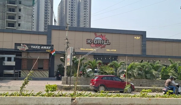 Popular Local Dining Exterior view of the K-Grill restaurant in Tellapur, showcasing the vibrant local dining and culinary options available close to the Prestige Golden Grove community