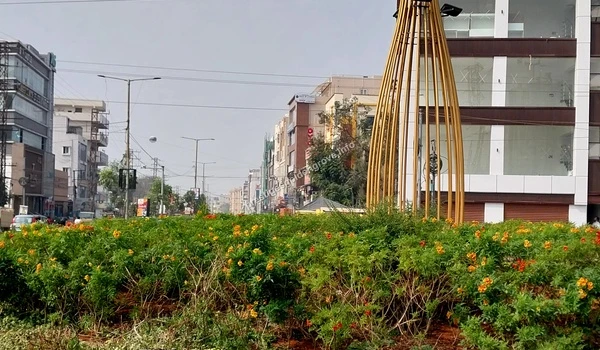 Tellapur Junction Roundabout View of the well-maintained Tellapur Junction roundabout highlighting the organized urban planning around Prestige Golden Grove in Hyderabad