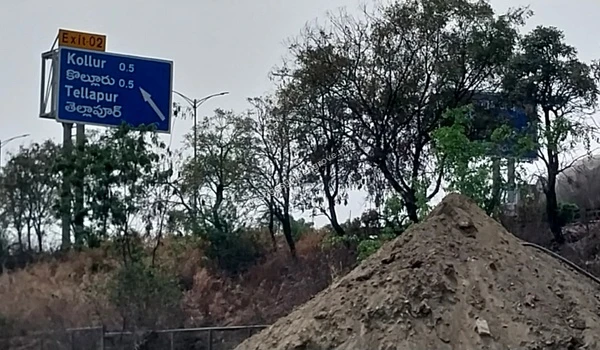 Kollur Tellapur Exit Signage Road signage for Exit 02 directing to Kollur and Tellapur highlighting the prime location and accessibility of Prestige Golden Grove